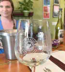 Bartender and wine glass at Vino Salida